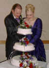 Cutting the cake.JPG (803449 bytes)
